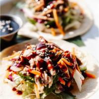 S8. Duck Taco · Roasted duck on top of tortilla, served with signature hoisin sauce.