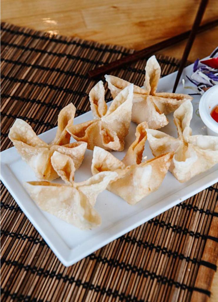 S12. Crab Cheese Wonton · Fried wonton wrapped with cream cheese, imitation crab, served with sweet chili sauce.