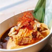 C4. Massaman Curry · Flavored with Massaman curry paste with an edition of Persian spices, slowed cooked potatoes...