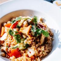 R2. Cashews Nut Fried Rice · Stir fried rice with chili jam, yellow onion, red and green bell peppers, and cashew nuts.
