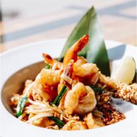 P1. Pad Thai · Stir fried thin rice noodle with pad thai sauce, bean sprout, green onion, and egg. topped w...