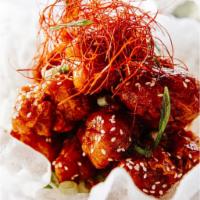 P5. Orange Chicken · Deep fried chicken topped with orange sauce and sesame seed.