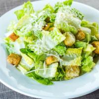 Entree Caesar Salad · Chopped romaine, Parmesan, brioche croutons, Caesar dressing.