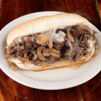 The Original Philly Cheese Steak · Philly bun with seasoned sliced ribeye grilled with onions and topped with provolone or Swis...