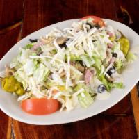 Italian salad · Includes, crispy romaine and iceberg lettuce, fresh tomatoes, black and green olives, mushro...