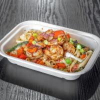 Shrimp Creamy Cajun Pasta  · 5 sauteed shrimp served on top of a bed of creamy fettuccine pasta with tons of fresh veggie...