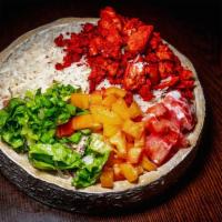 Chik'N Over Rice Platter  · Served with chicken, rice, lettuce and tomatoes along with your favorite toppings and hot sa...