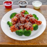 H2.Sesame Chicken · Chunk chicken light fried with hot bean sauce. Famous in szechuan army with sesame seeds. Wi...