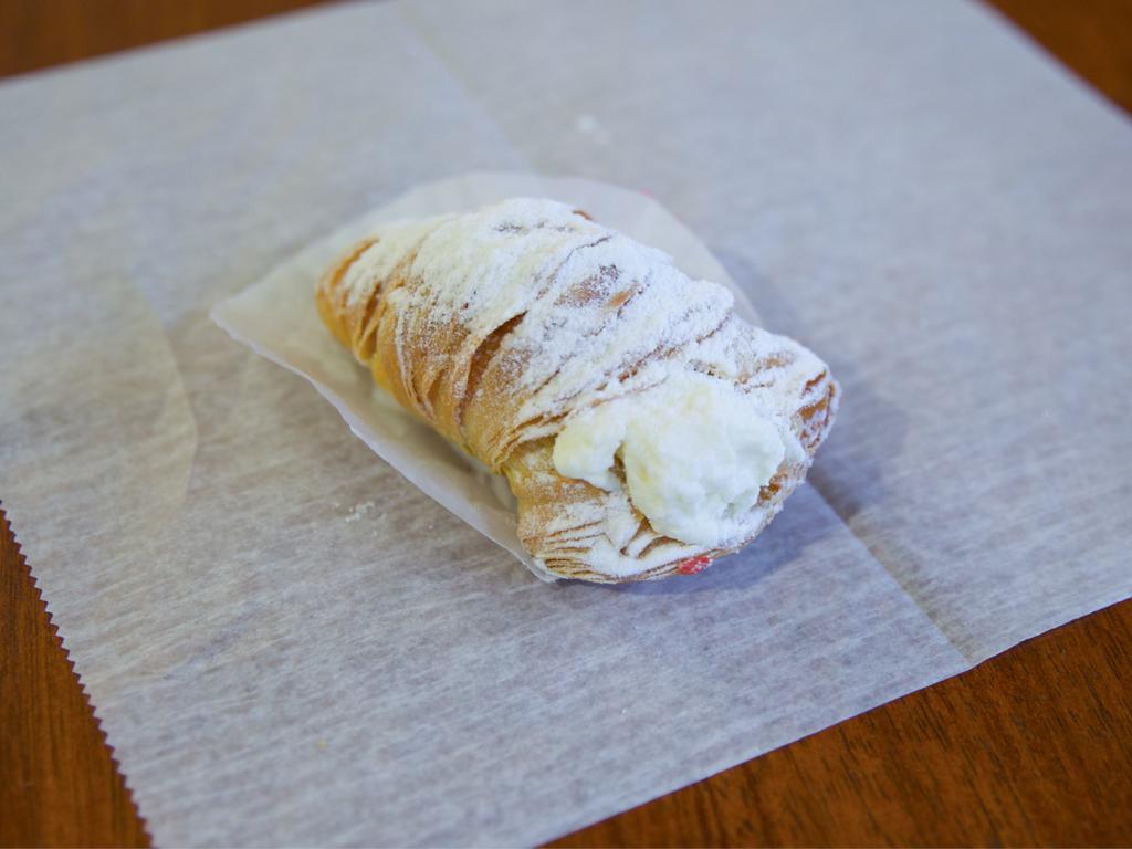 Lobster Tails · Whipped cream and custard filling.