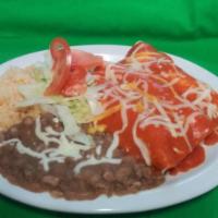 Enchiladas · Served with choice of meat. Includes 3 enchiladas, rice and beans garnished with lettuce and...