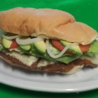 Milaneza Torta · Breaded beef. Includes beans spread, mayonnaise cheddar, lettuce, onions and tomatoes and me...