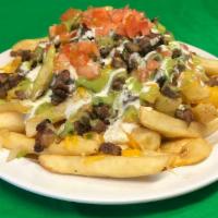 Asada Frys · A bed of French fries, mozzarella cheese with grilled steak or grilled chicken garnished wit...