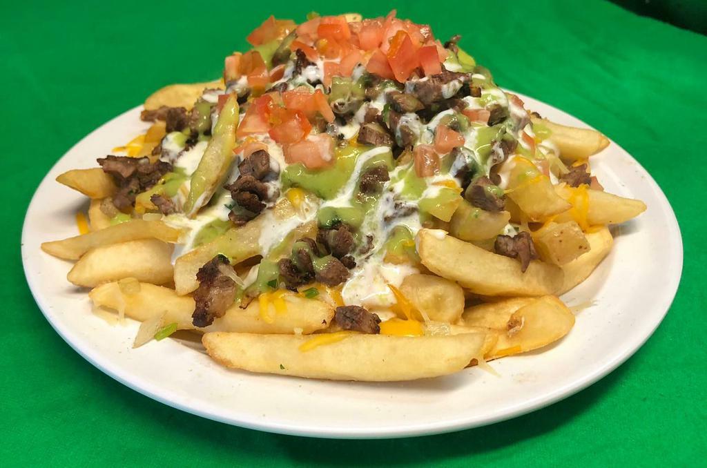 Asada Frys · A bed of French fries, mozzarella cheese with grilled steak or grilled chicken garnished with tomatoes sour cream and Guacamole 