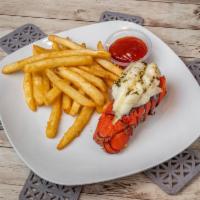 The One Lobster Tail · 3-4 ounces broiled with garlic butter. Served with French fries or garlic bread