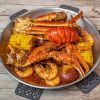 Boil Combo 5 · 1 lobster tail, 1 lb snow crab, 1 lb shrimp head-on, 3 potatoes, 2 corns