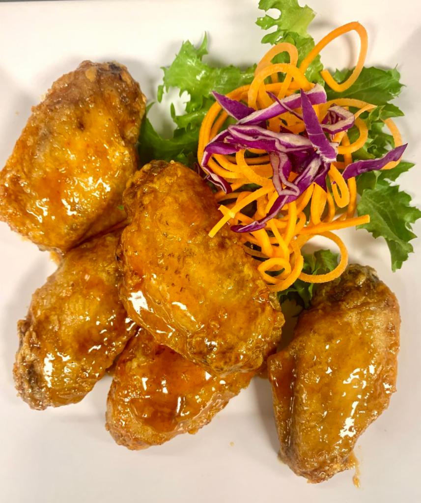 Sriracha Wing · Served with sweet chili dip.