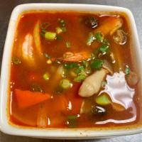 Tom Yum Soup · Hot and sour. Shrimp with fresh lemongrass, kaffir, lime leaves, mushroom, chiles.