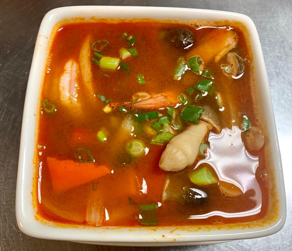 Tom Yum Soup · Hot and sour. Shrimp with fresh lemongrass, kaffir, lime leaves, mushroom, chiles.