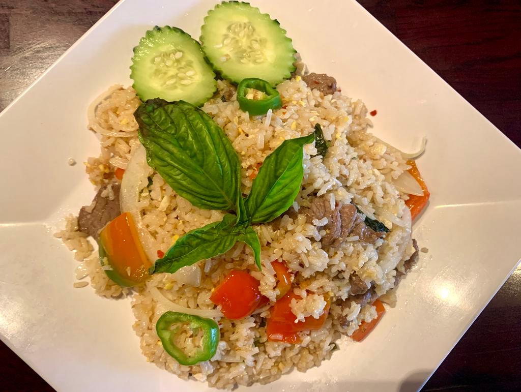 Basil Fried Rice · Jasmine rice with basil, chili, bell pepper, onions and spicy.