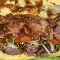 #526 Hot Roast Beef SPECIAL! · With gravy, melted cheddar, bacon, lettuce, tomato.