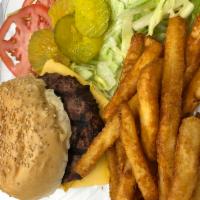 Cheeseburger Deluxe · With french fries, lettuce, tomatoes, pickle chips.