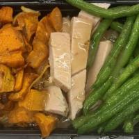Roasted Turkey DINNER · Served with sweet potatoes and vegetables. No special instructions please.