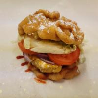 Funnel Cake Burger - NEW ITEM · Ketchup, Lettuce, Tomatoes Red Onion, Angus Chuck Beef Pattie, American Cheese.