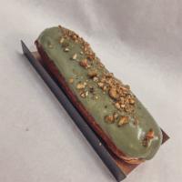 Eclair Pistachio · Choux dough, pistachio cream with chocolate, icing, shredded pistachios