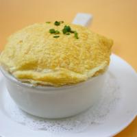 Chicken Pot Pie · Shredded chicken, potatoes and seasonal vegetables in a creamy gravy topped with a golden pu...