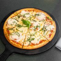 Margherita Pizza · Marinara, fresh mozzarella and basil.