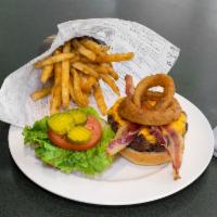Elements Burger · House seasoned ground beef, cheddar cheese, bacon, lettuce, tomato, onion rings, pickles, Di...