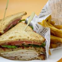 Turkey Club · Served with bacon, lettuce, tomato, Swiss and mayo on a multi grain bread.