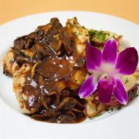 Chicken Breast · Served with roasted potatoes, mushrooms and pan jus.