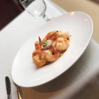 Shrimp Scampi · Shrimp sauteed in garlic, olive oil and white wine served with vegetable rice.