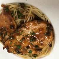 Veal Picatta · Veal Cutlet, Capers, Lemon & Demi-Glace on a bed of Spaghetti