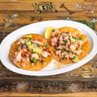 Tostada de Ceviche · Snapper and shrimp mixed with jalapeno, onion and tomato with pico de gallo and avocado.