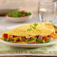 Vegetable Omelette · Omelette with tomatoes, onions, and green peppers.
