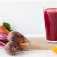 Caitlin Juice · Beet, orange, carrot, ginger, and lemon.