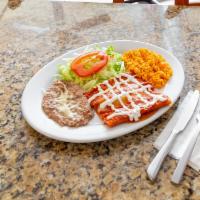 Enchiladas Verdes Platillo · Soft tortilla rolls and sour cream, stuffed with any meat.