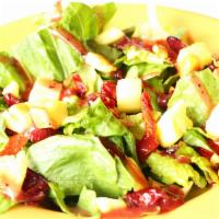 Nutty Hawaiian Salad · Romaine lettuce with cashews, pineapple, sun-dried tomatoes, and cranberries.