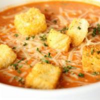 Creamy Tomato Basil Soup · Smooth soup with pureed tomatoes and basil.