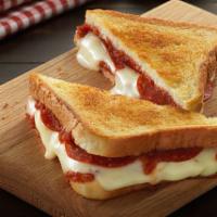 Pete's Pizza Grilled Cheese · Boar’s Head® Mozzarella, parmesan, pizza sauce, pepperoni, and basil on white bread.