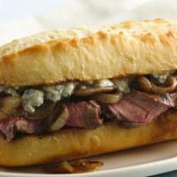 The Steak Sub · Juicy sliced steak, melted provolone cheese, and sauteed bell peppers and onions on a hoagie...
