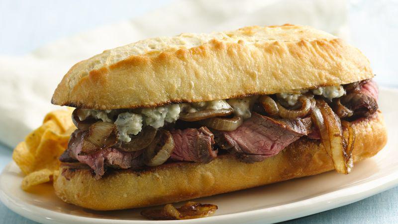 The Steak Sub · Juicy sliced steak, melted provolone cheese, and sauteed bell peppers and onions on a hoagie roll.