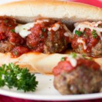 The Meatball Sub · Juicy, tender meatballs in our house marinara sauce and melted mozzarella cheese on a hoagie...