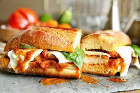 The Chicken Parm Sub · Crispy breaded chicken cutlet slathered with marinara and mozzarella cheese on a hoagie roll.