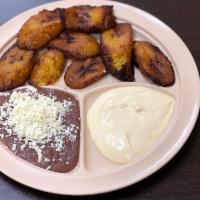 Platano Maduro Frito · Fried plantain. Frijoles, queso y crema. Served with beans, cheese and cream.