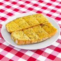 Garlic Bread ·  Add dipping sauce for an extra charge.