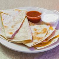 Cheesesteak Quesadilla · Philly steak meat and American cheese.