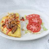BCTM Omelette · 3 eggs with bacon, cheese, tomatoes, and mushrooms.